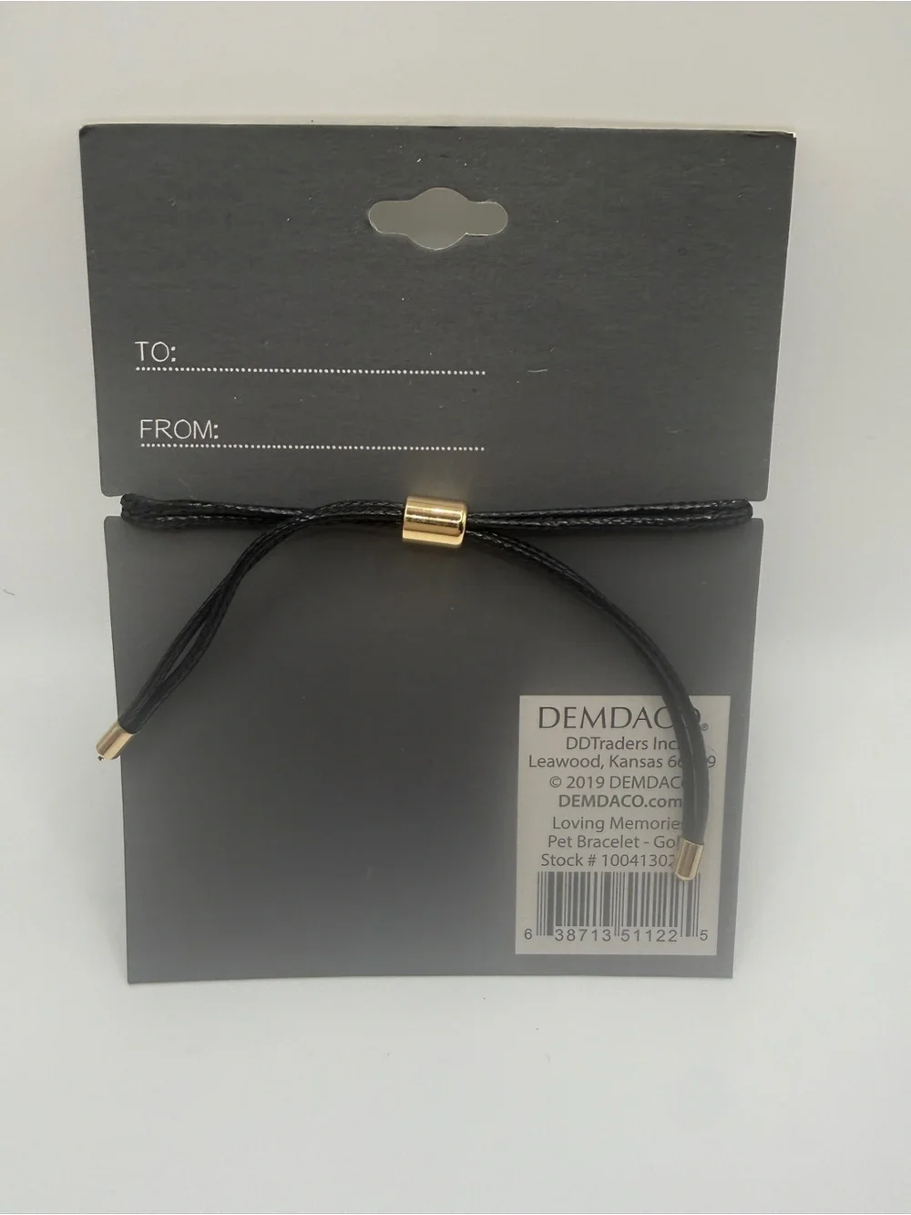 Demdaco Black Cord Bracelet with Gold Paw Accent